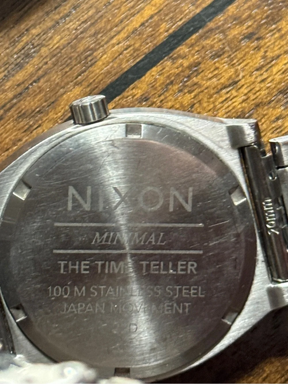 Nixon Silver Stainless Steel Watch with Blue Dial